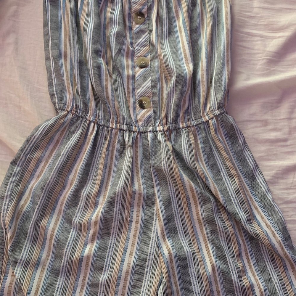 stripped romper with added on buttons